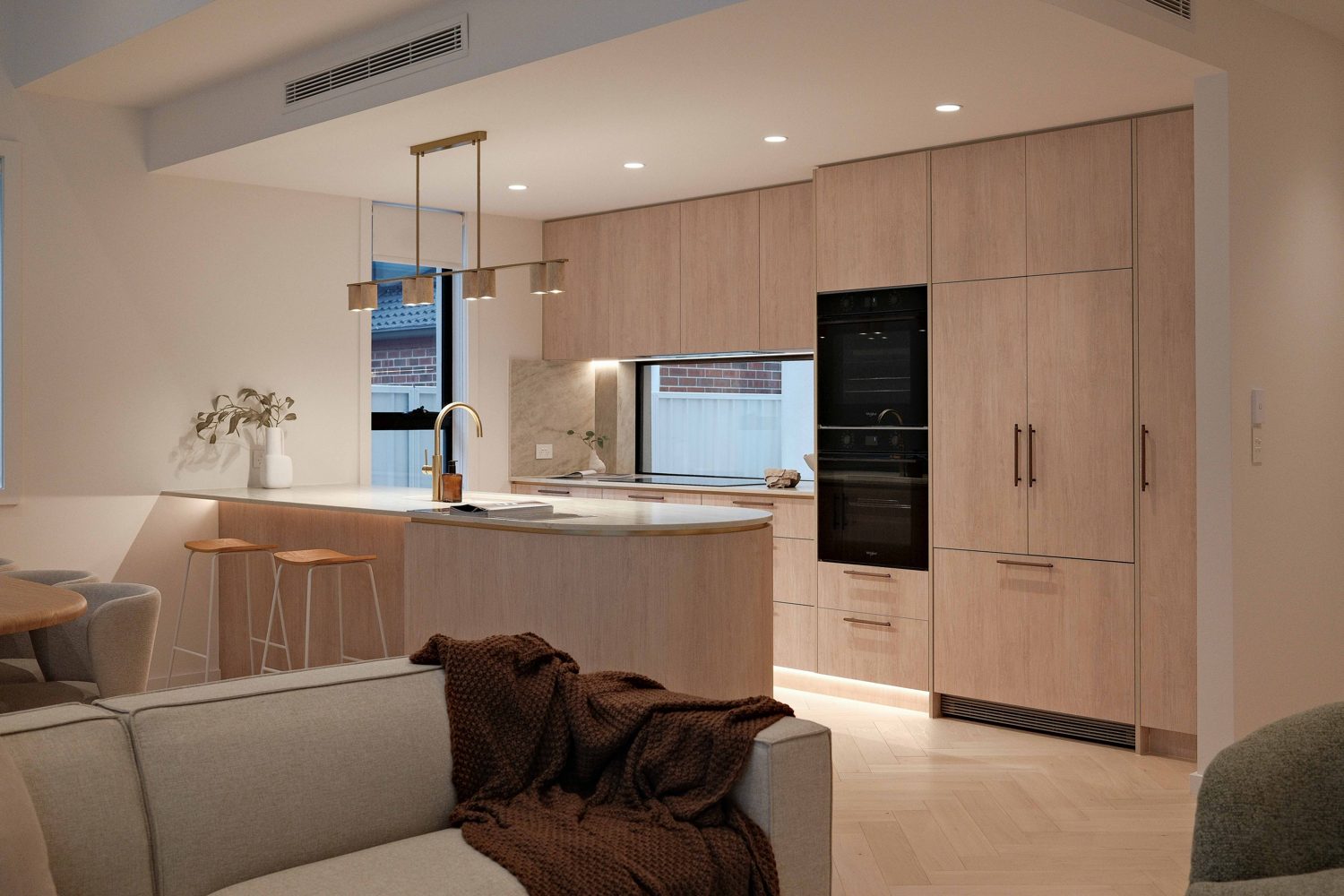 Finished kitchen and living area from the supplied marketing shoot